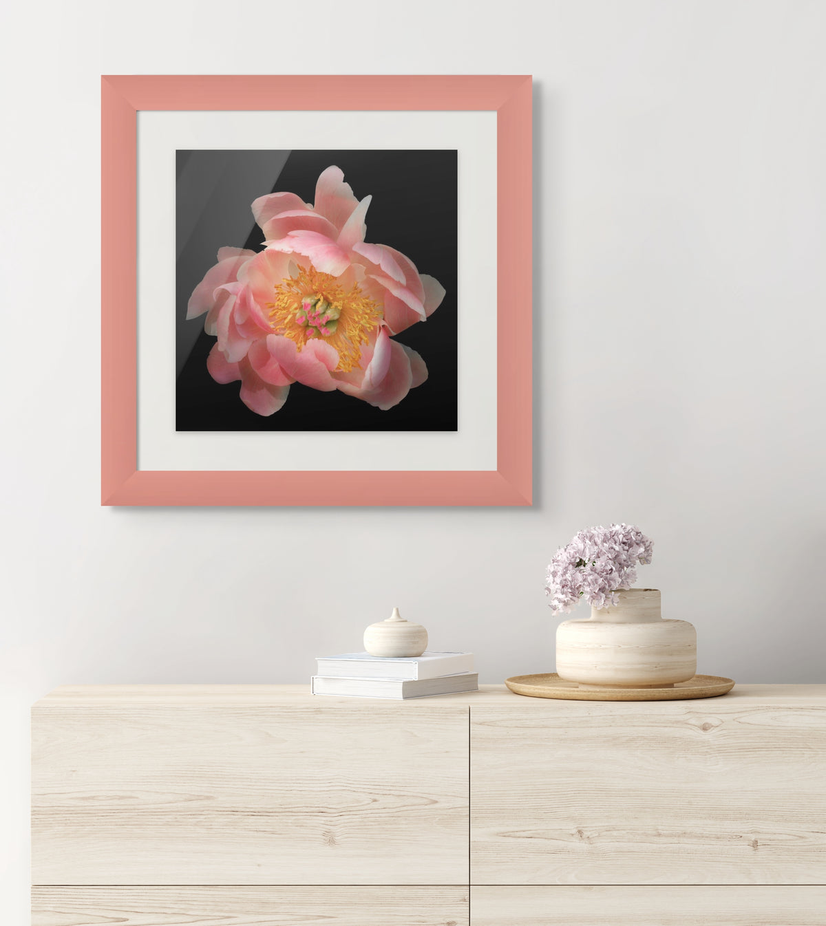 Framed flower pink peony hanging over a dressor